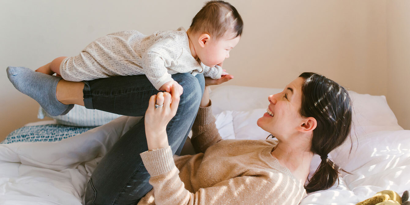 mom playing with baby - activities for 1-month-old