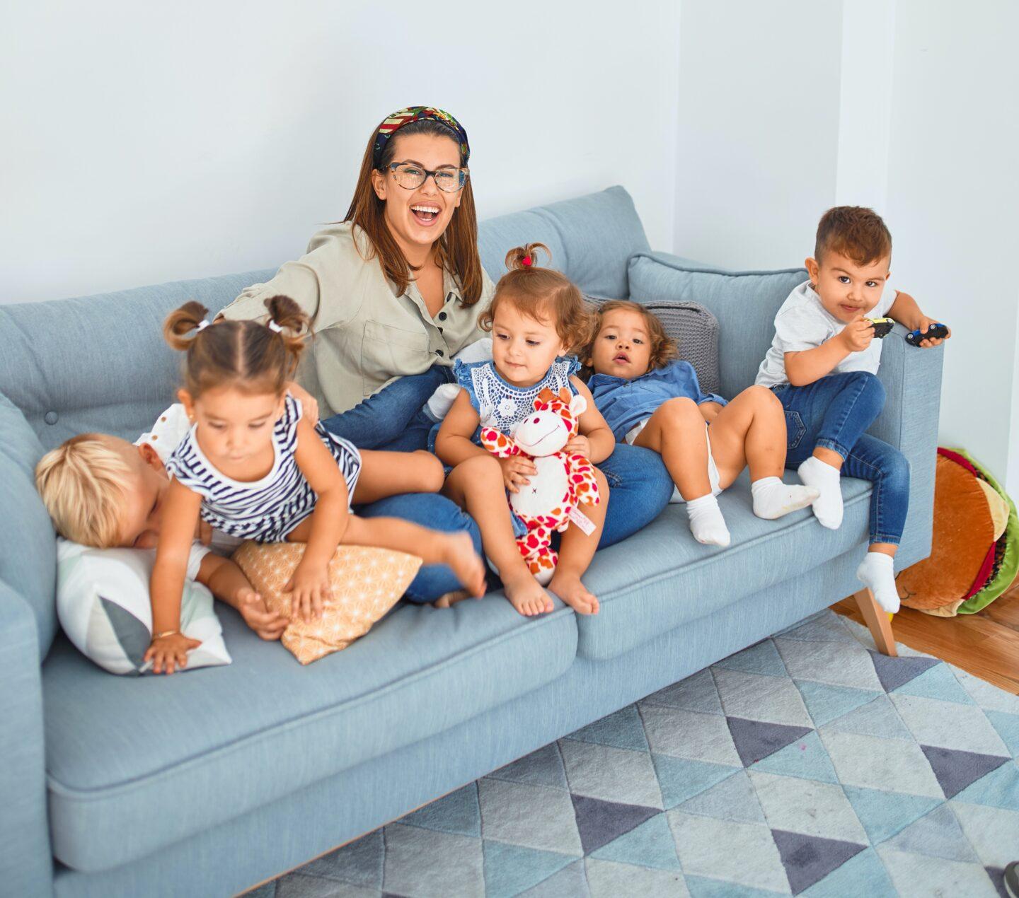 mom on couch with many children