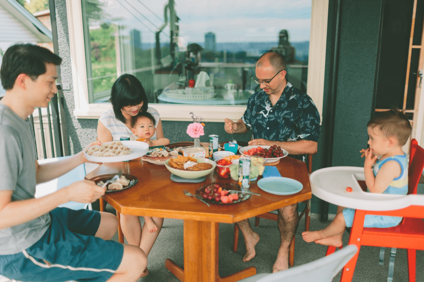 family eating dinner outdoors