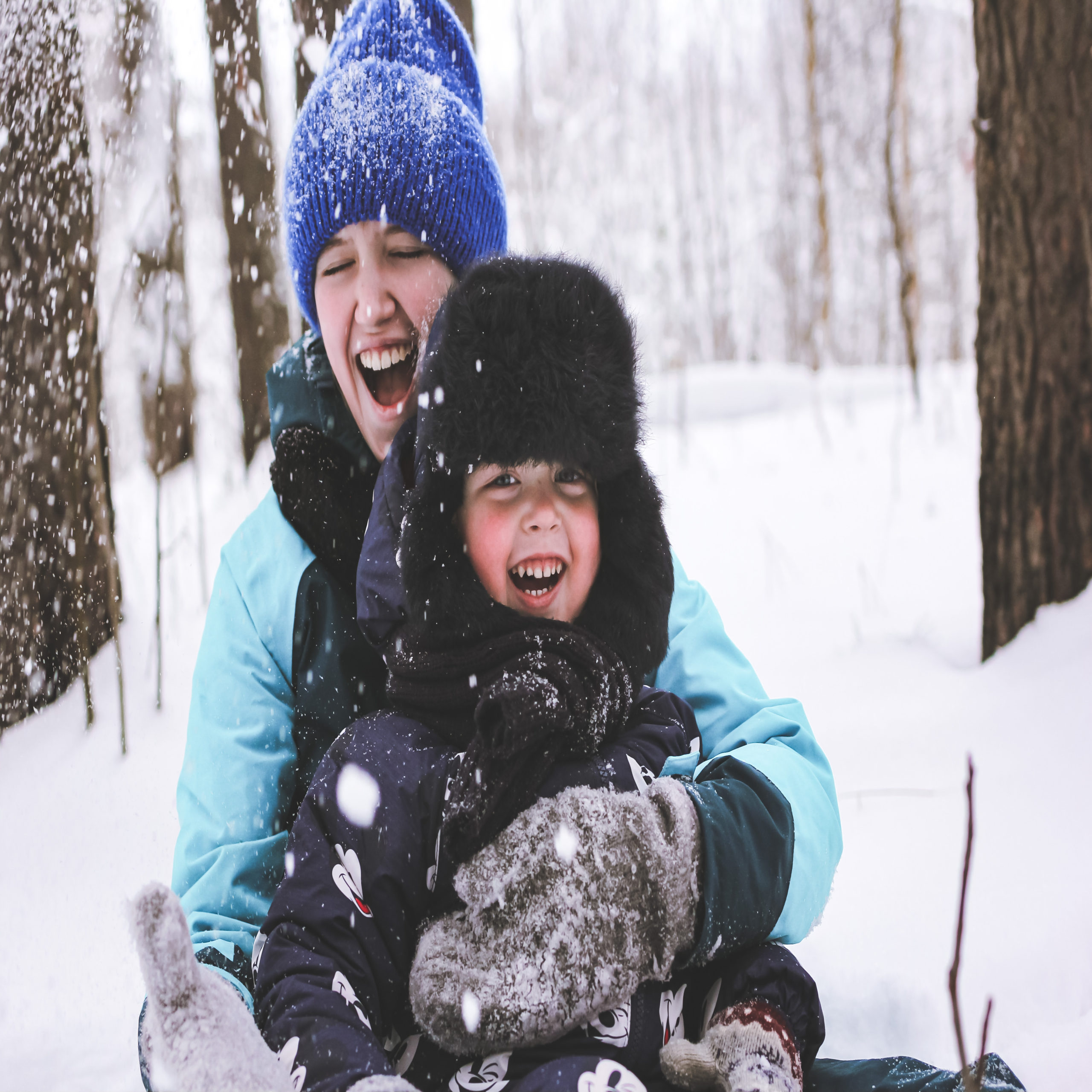 Mom and child in the snow day