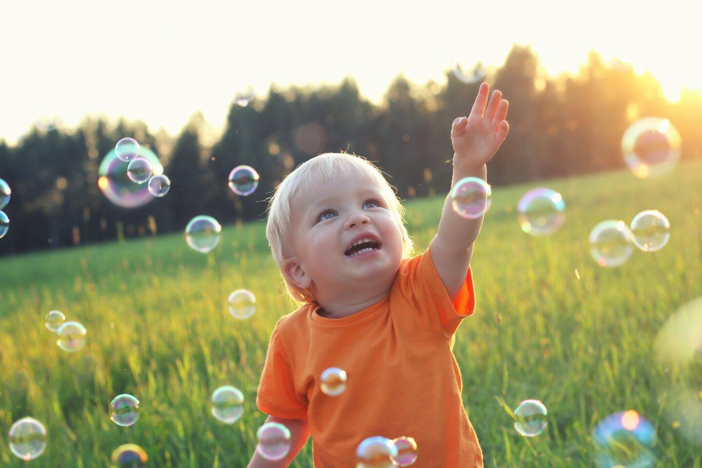 toddler enjoying summer outside