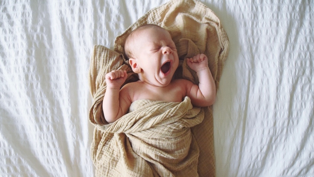 newborn sleep patterns what to expect when to rest featured Motherly