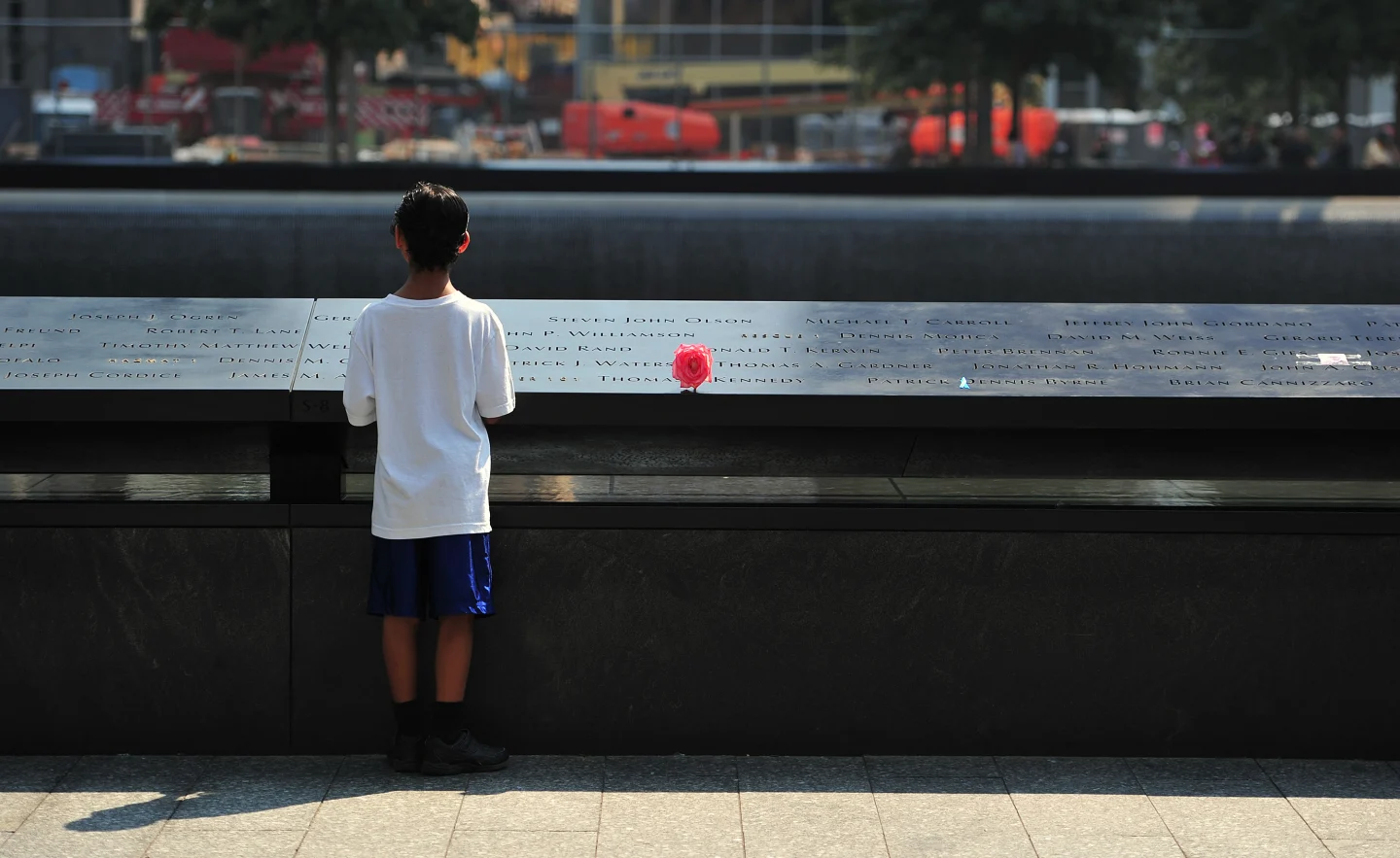 child standing in front of monument- how to talk to kids about 9/11