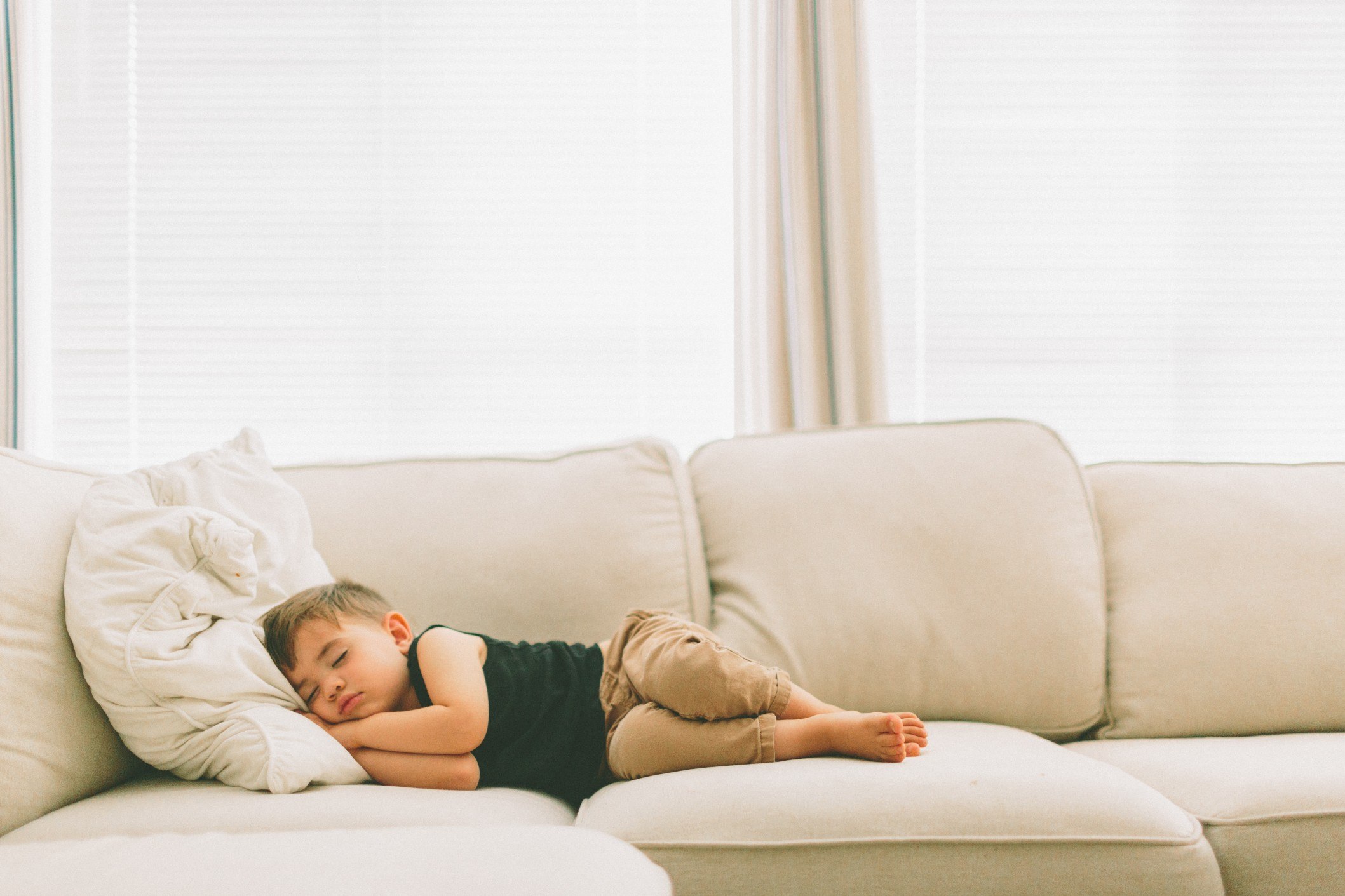 little boy nap on the couch