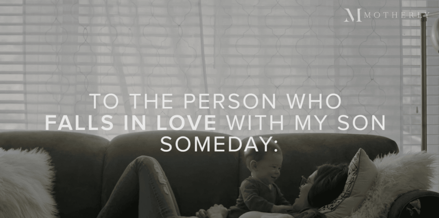 mom laying on the couch with son