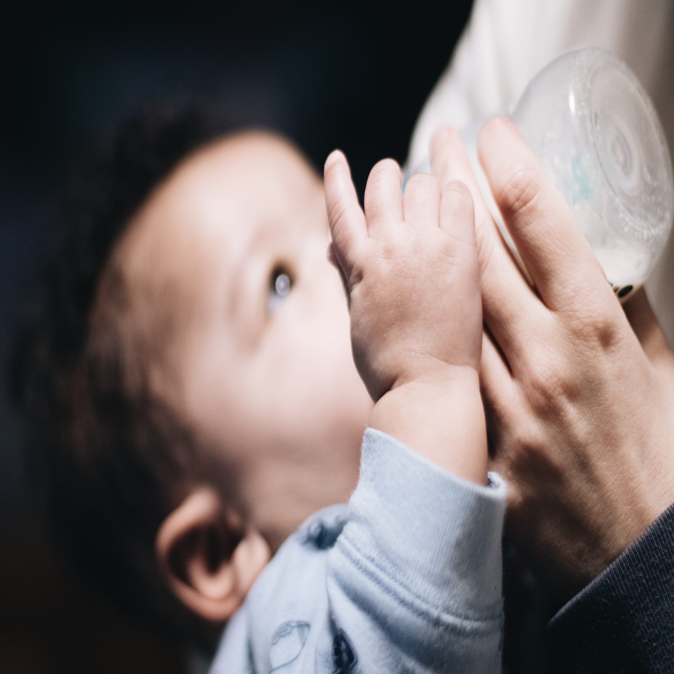 A baby and mom night feeding