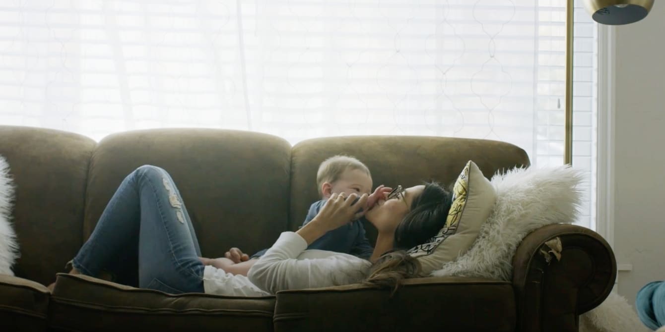 mom laying on the couch with baby - to the person who falls in love with my son