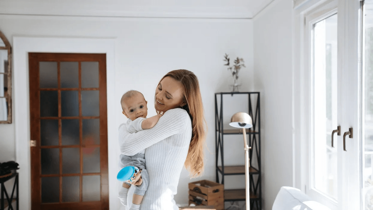 mom holding a baby