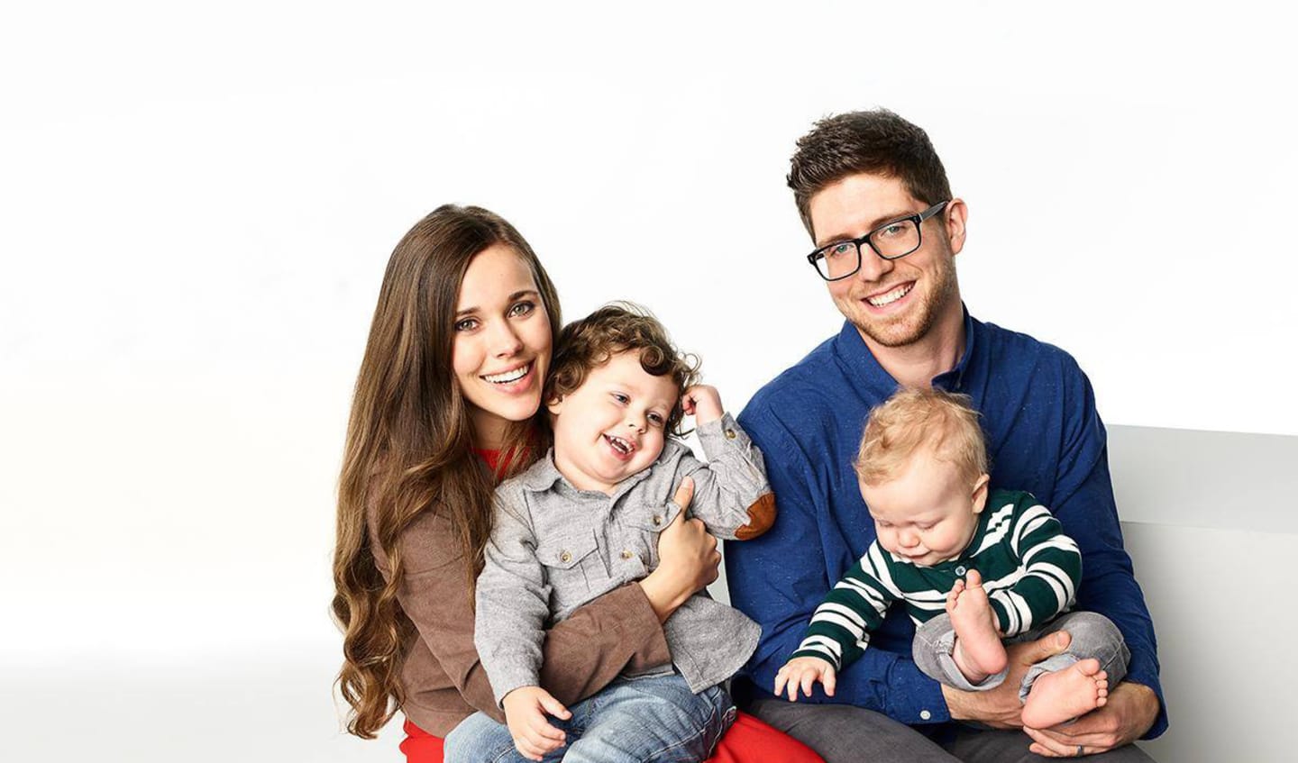 Jessa Duggar family portrait with partner and sons