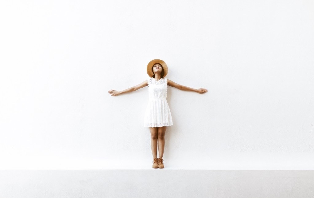 mom standing in front of a white wall