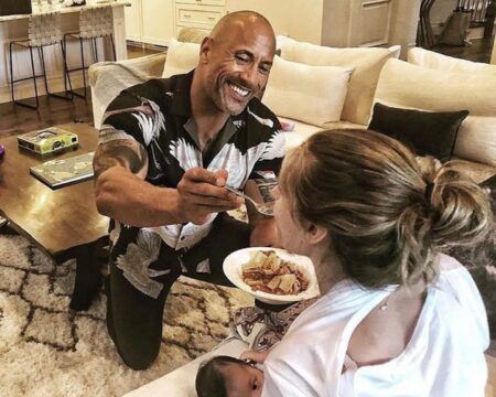 the rock how dads support breastfeeding featured Motherly