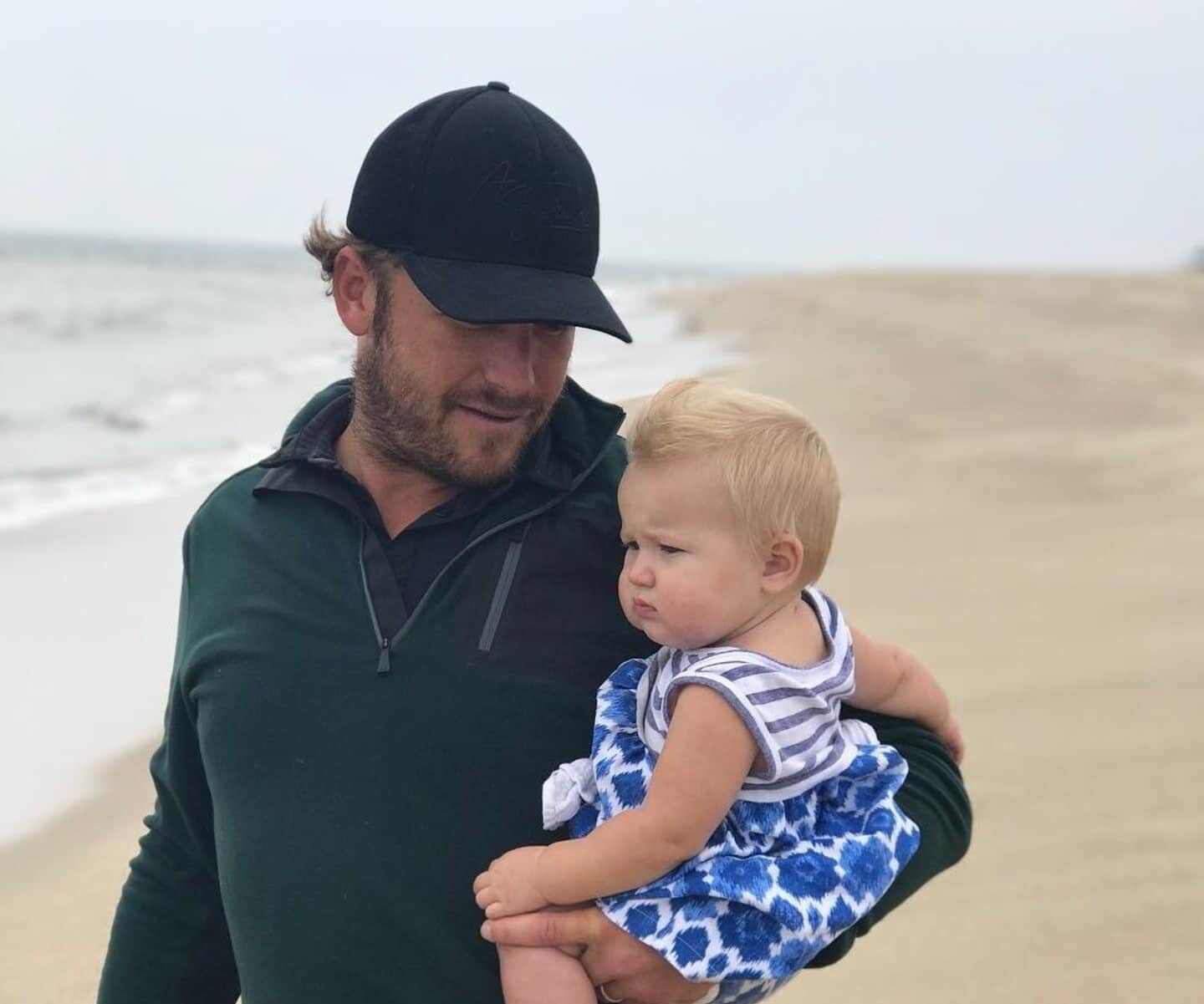 Bode Miller carrying child