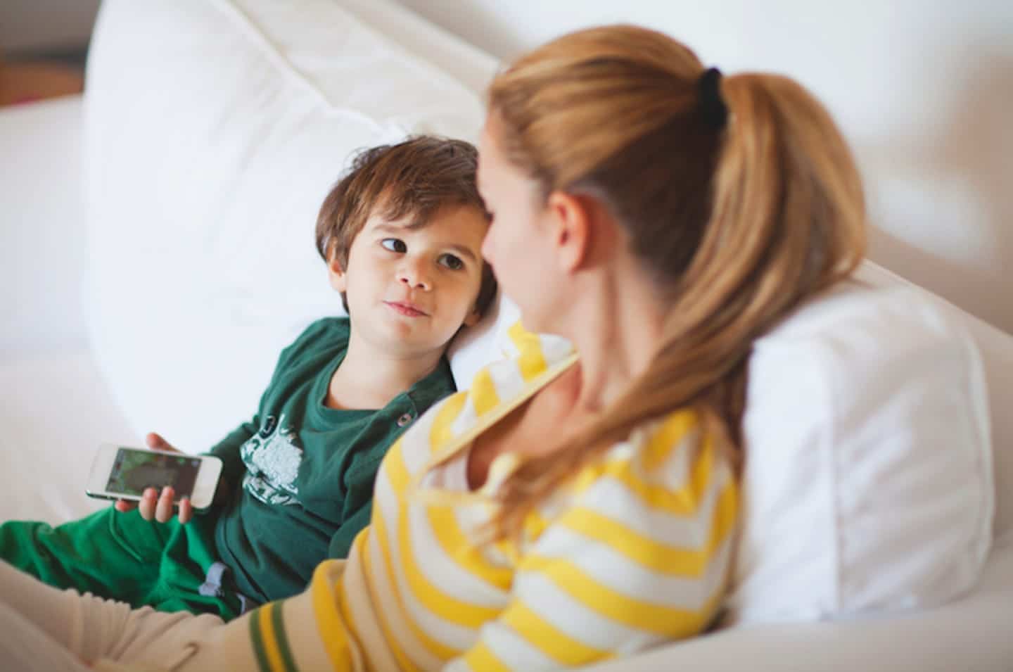 child looking up at mom