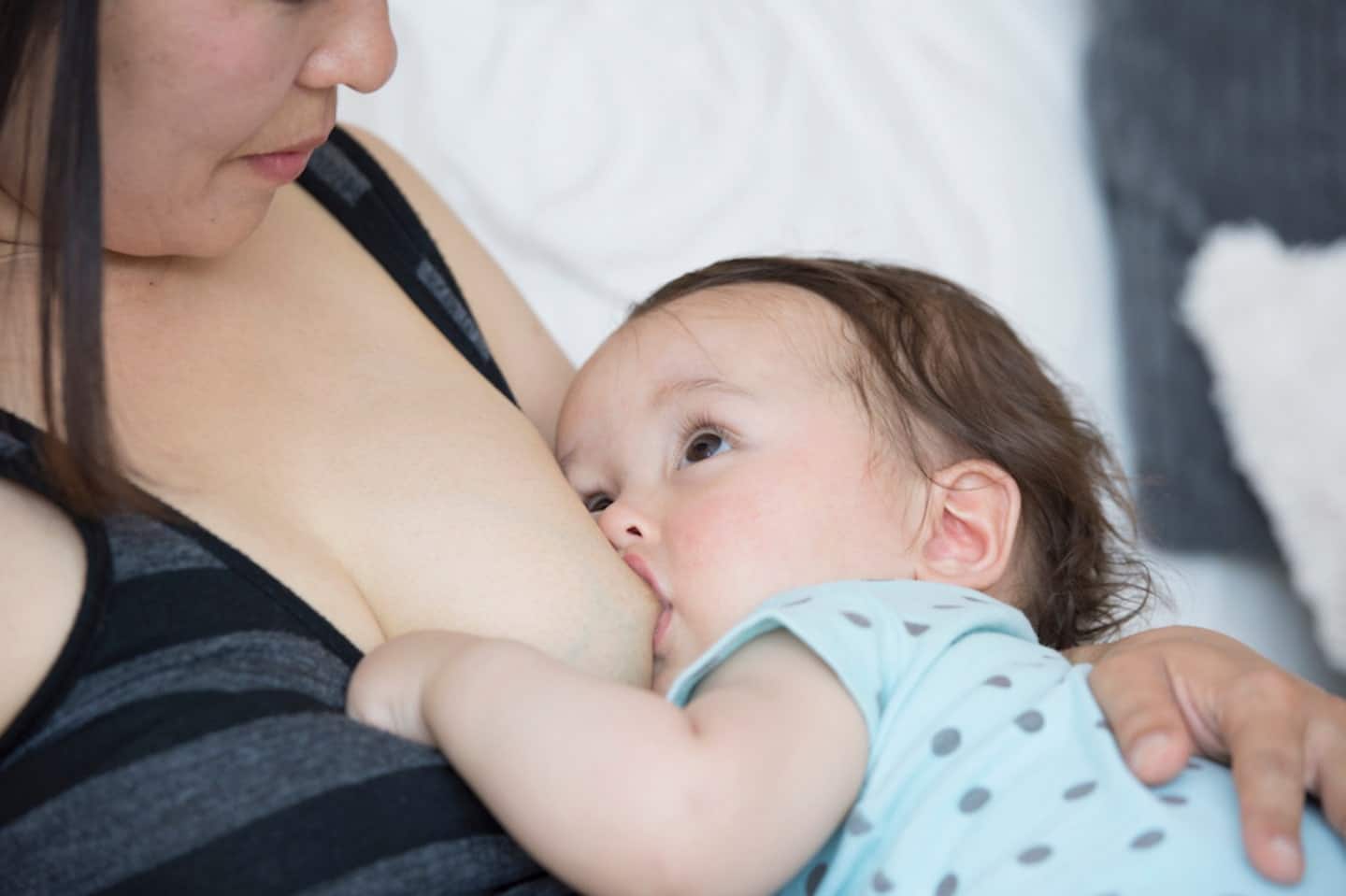 mom breastfeeding baby