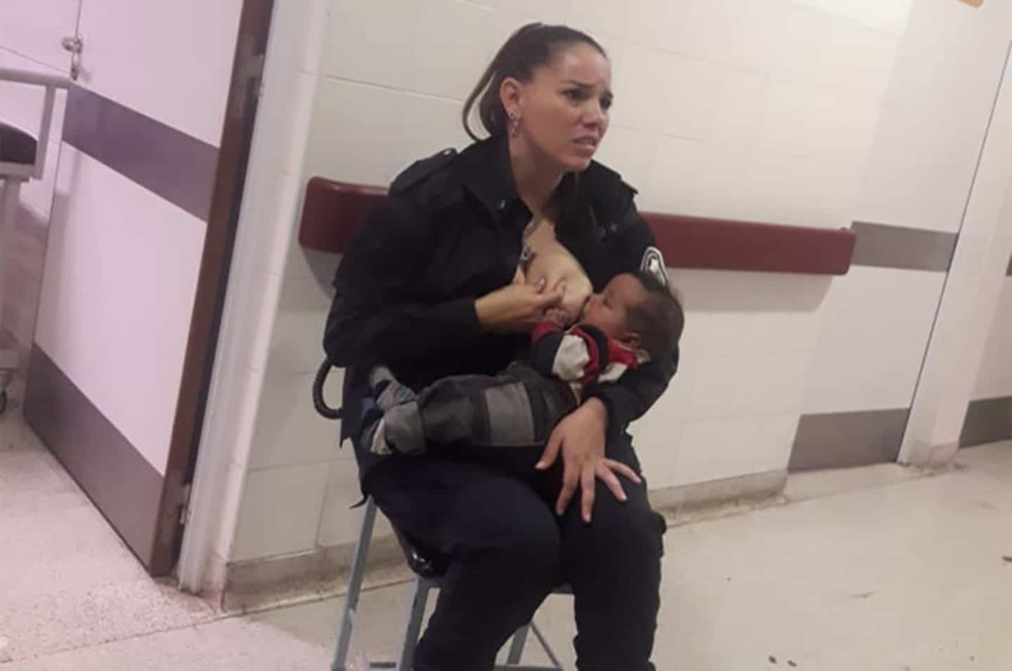 cop breastfeeding a baby