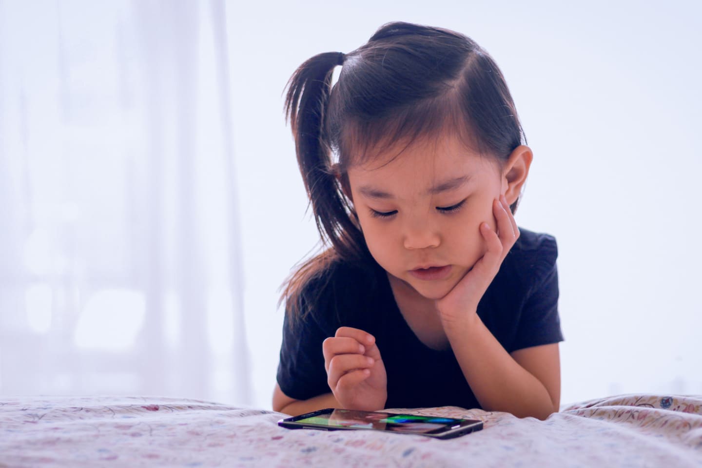 child watching on a cellphone