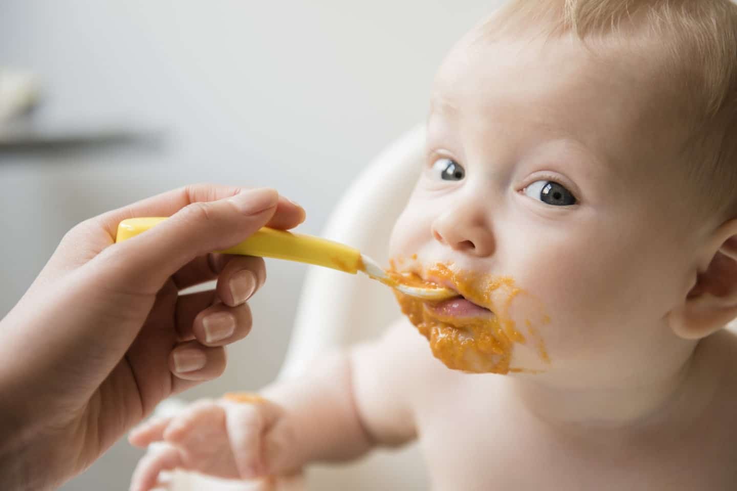 baby eating baby food