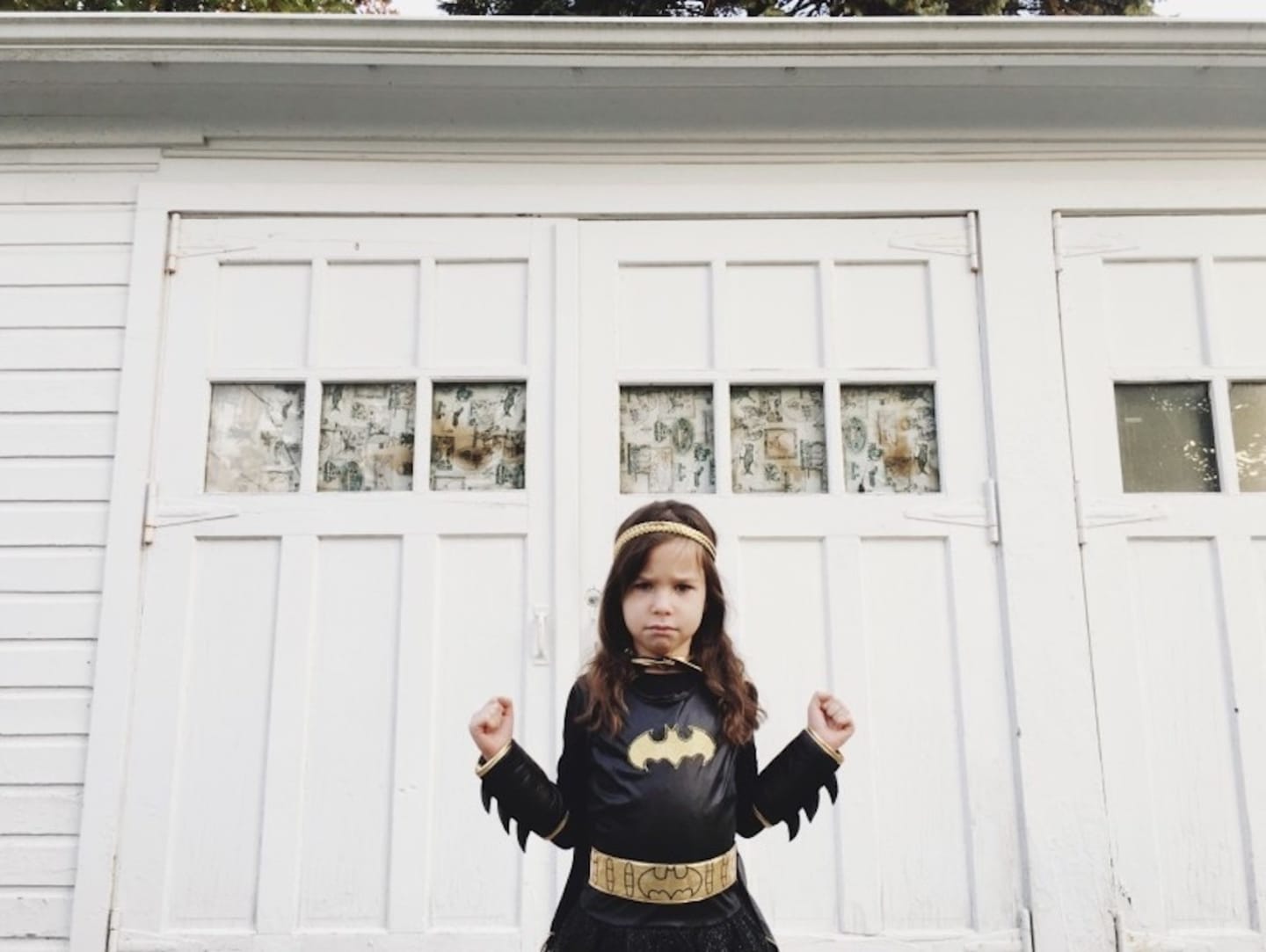 child wearing batman costume