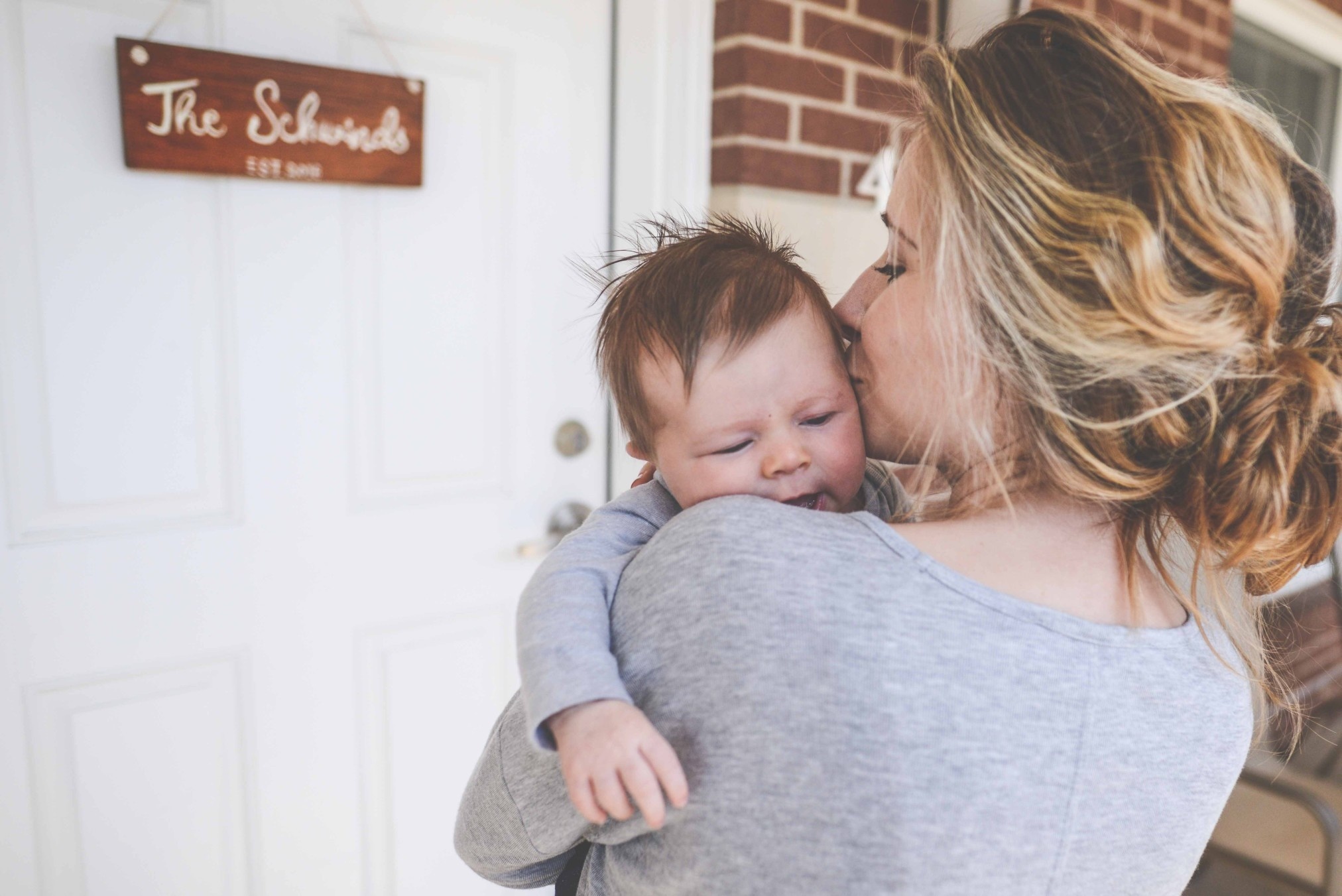 advice from mom of adults to new moms featured Motherly