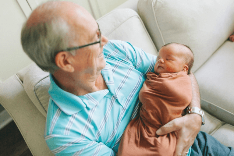 grandpa holding baby