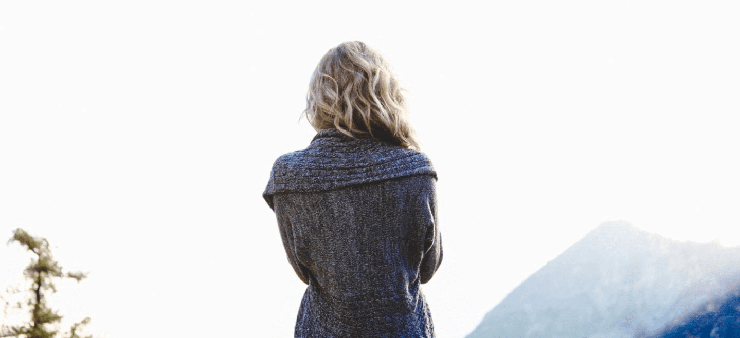 woman overlooking mountains