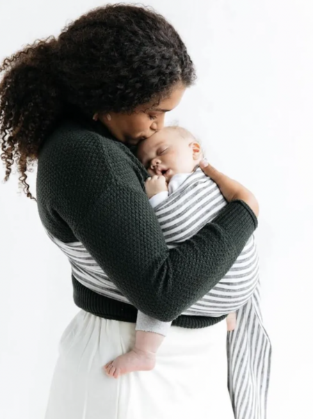 mom carrying a baby