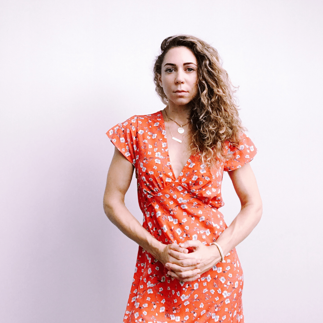 portrait of a woman wearing a red dress - essay on antidepressants while breastfeeding