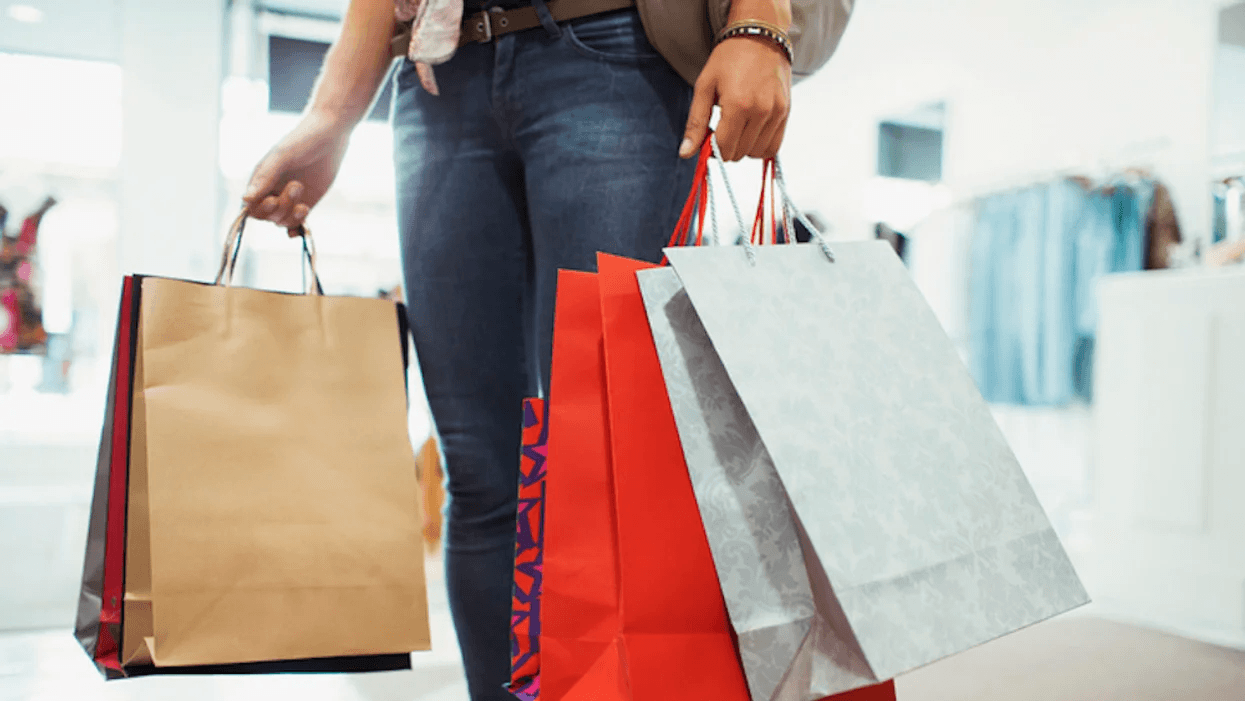 woman carrying shopping bags