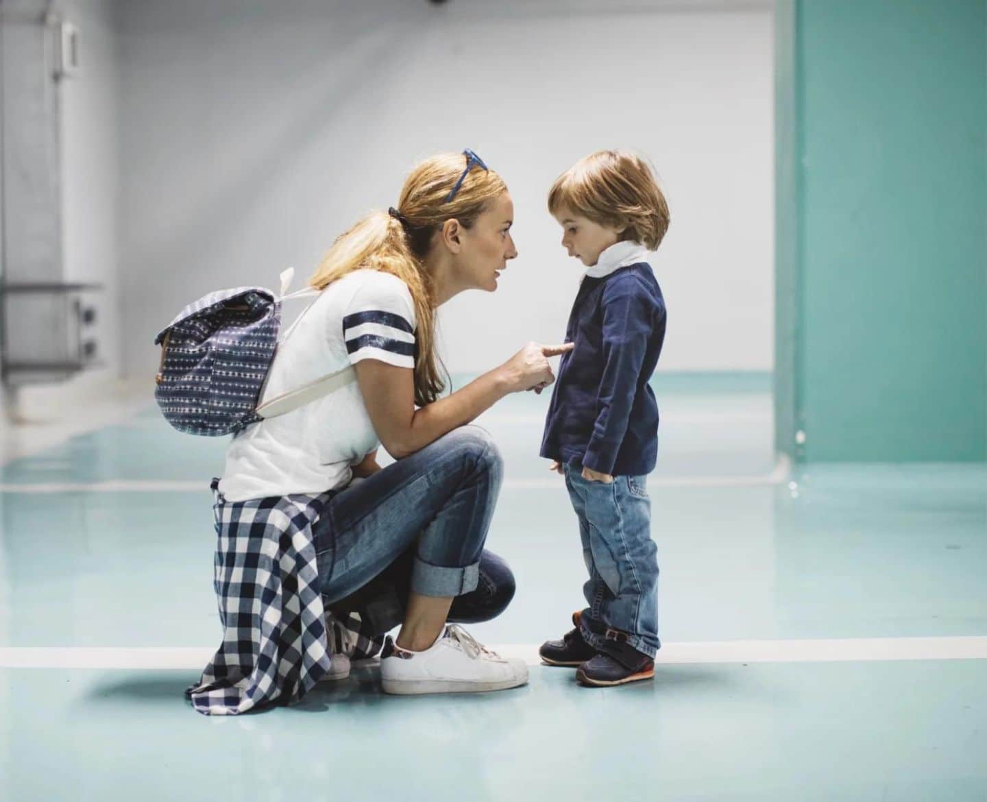 mom poingint finger talking to child- how to stop yelling at your kids