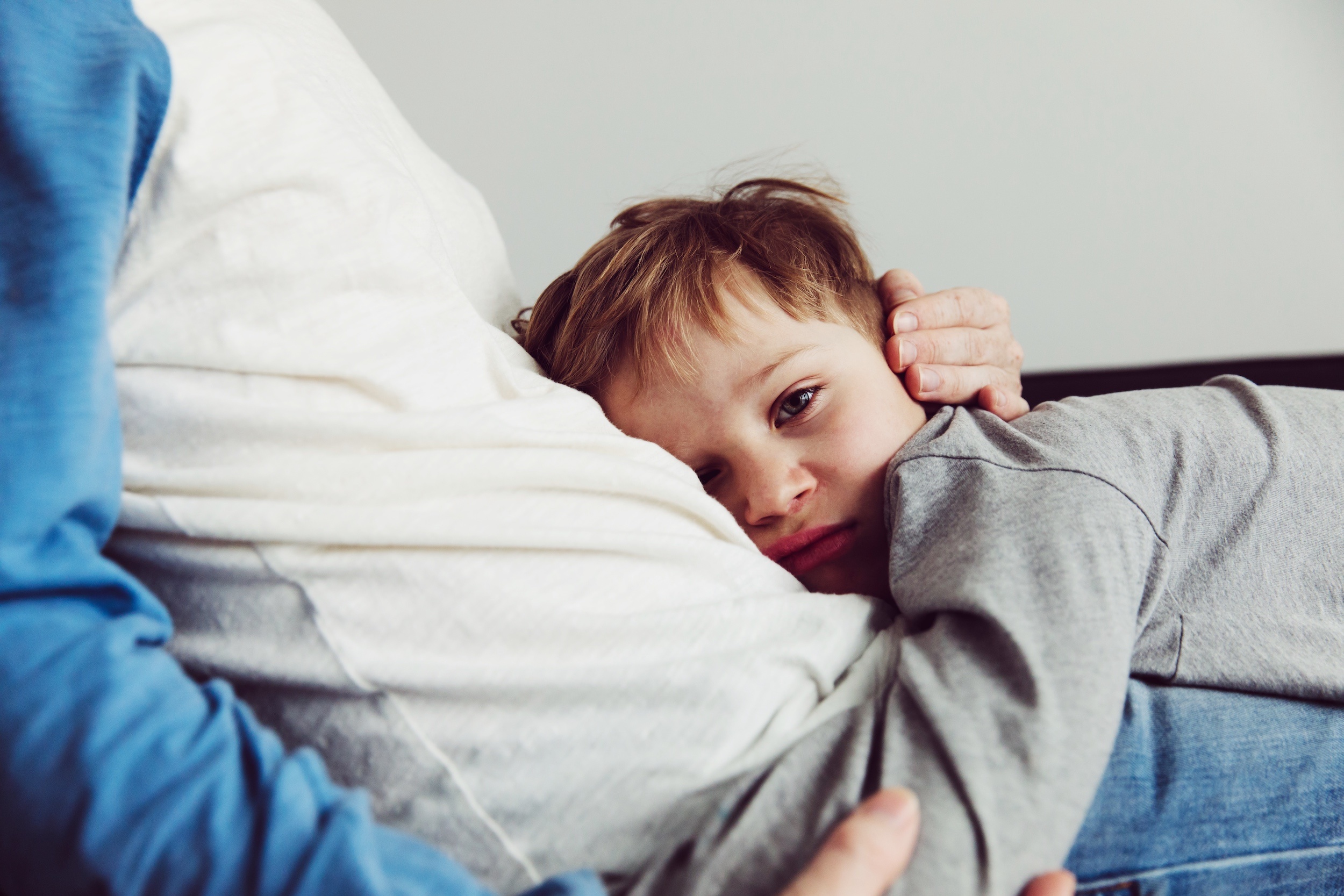 how to help grieving children during the holidays featured Motherly