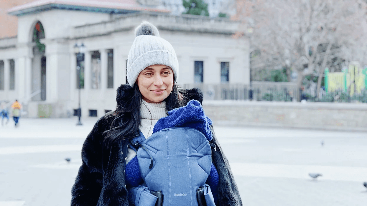 mom wearing baby in a BabyBjorn carrier