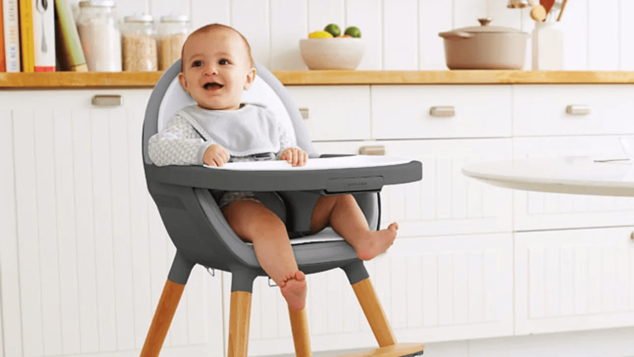 baby sitting in a high chair