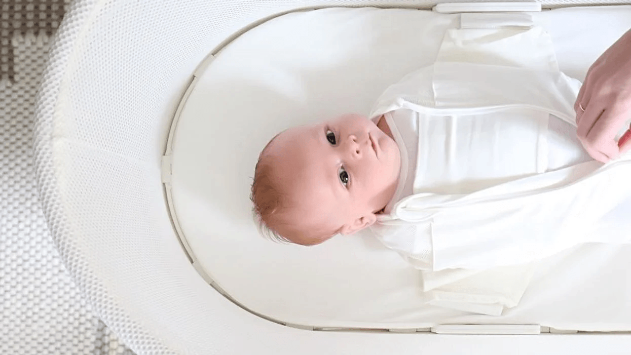 baby in snoo bassinet