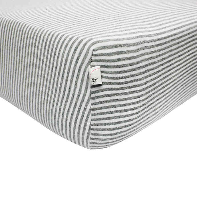 bbb burts bees baby bee essentials stripe 100 organic cotton fitted crib sheet in grey featured Motherly