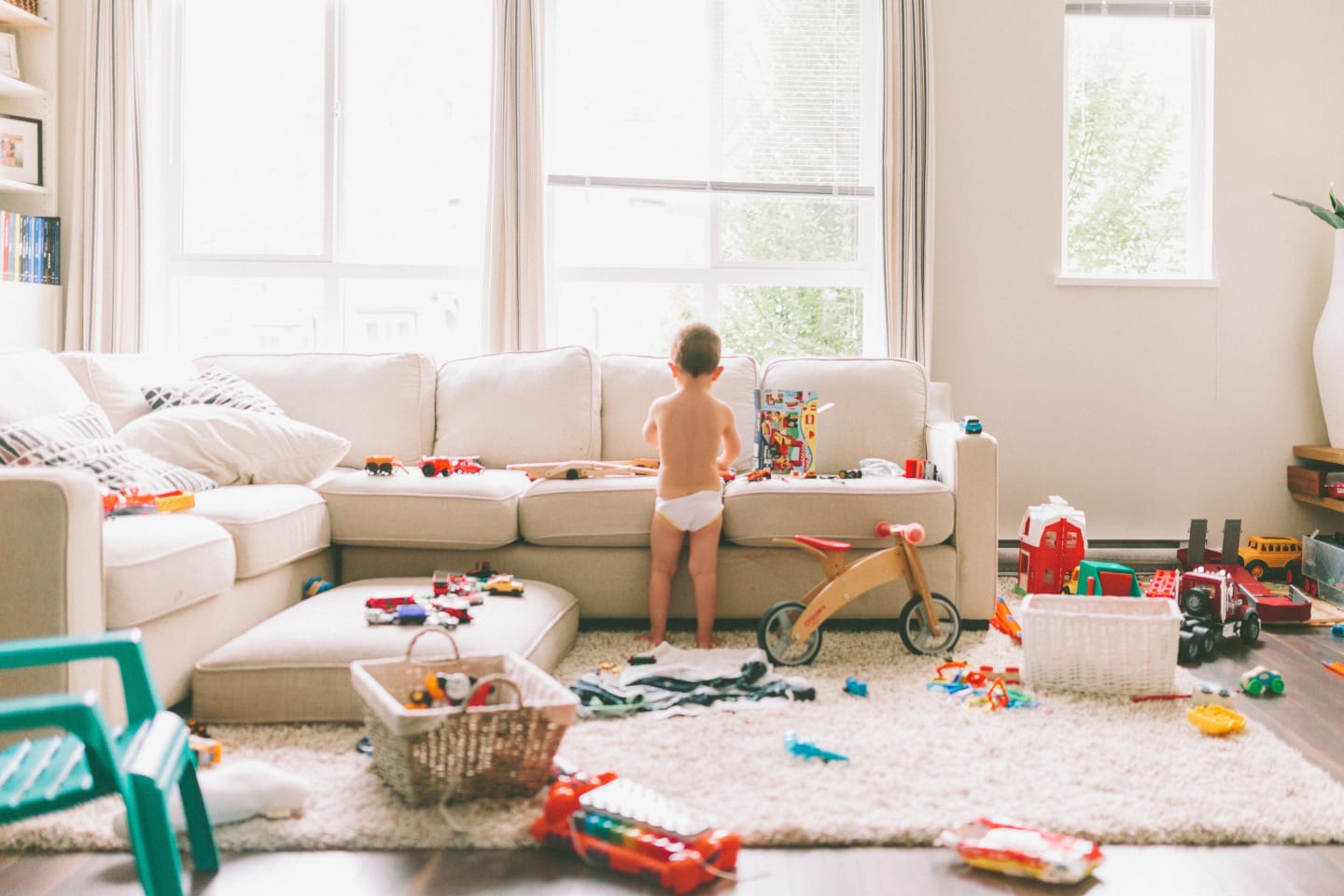 living room cluttered with toys