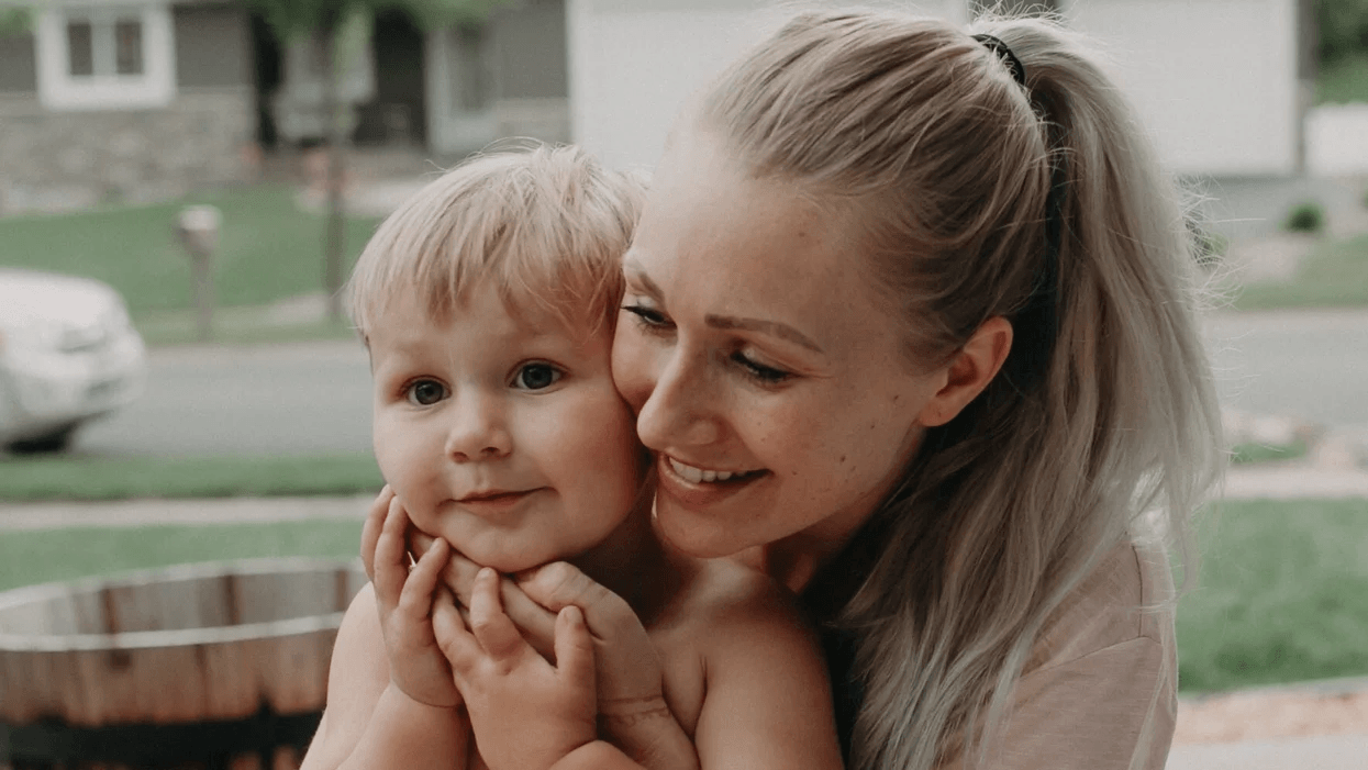 mom hugging son