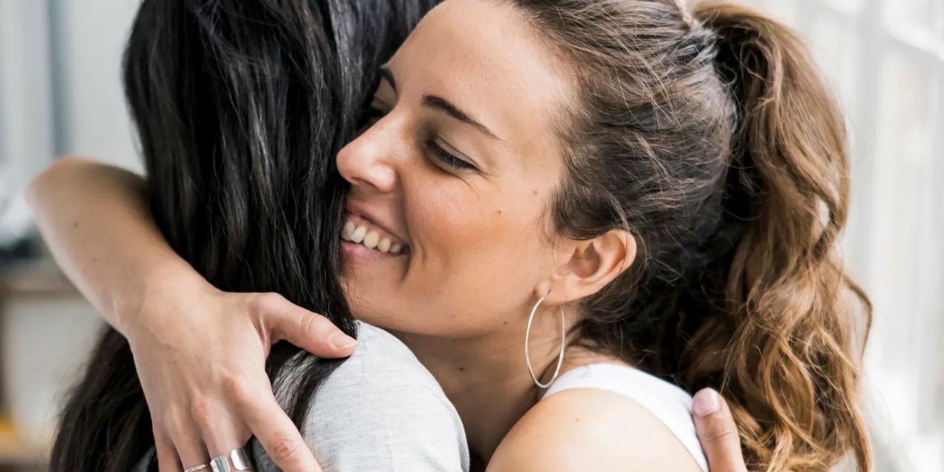 two women hugging