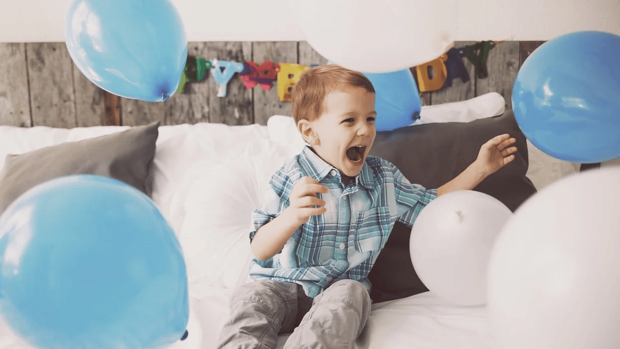 child happy at a birthday party