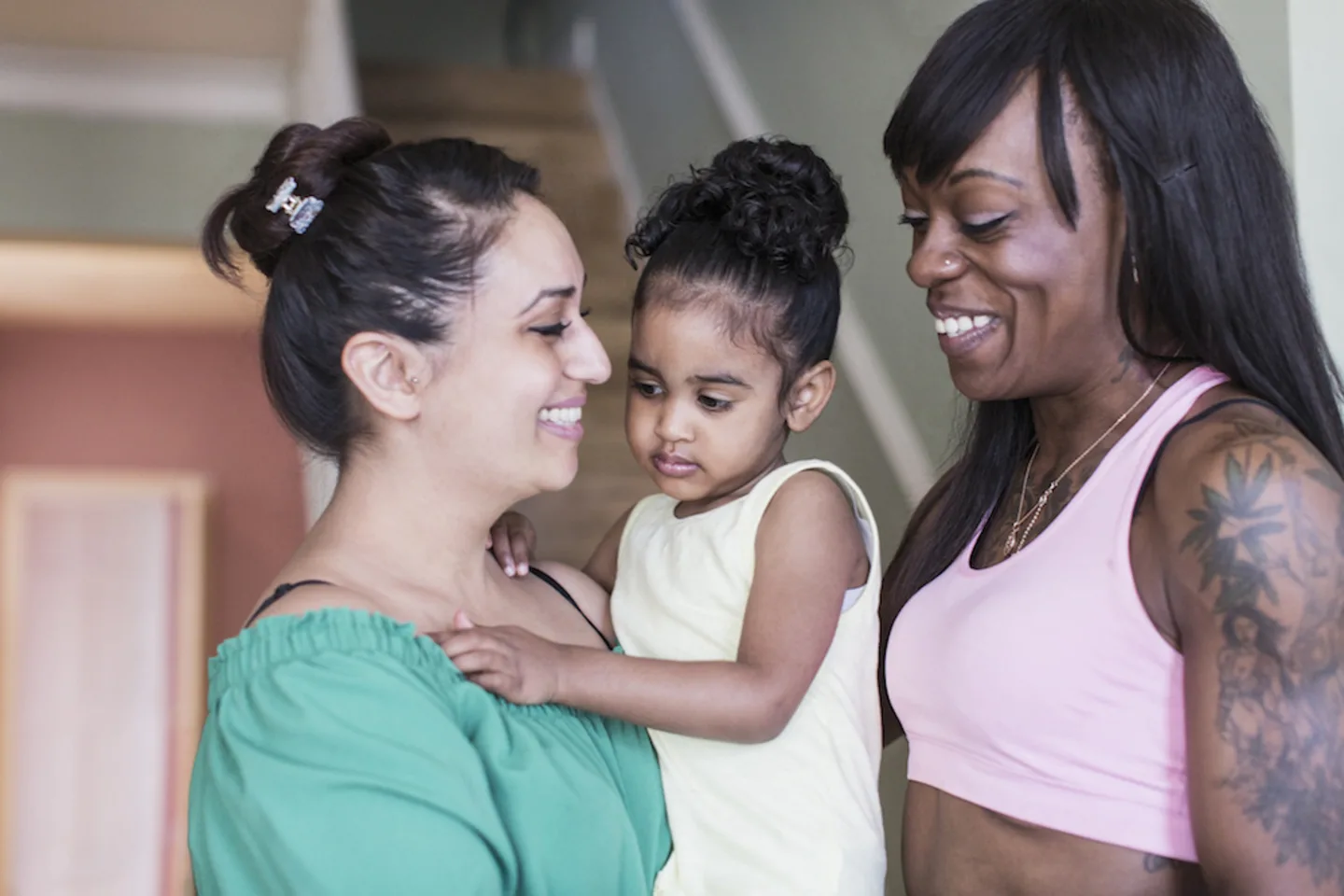 two women with little girl - blended family