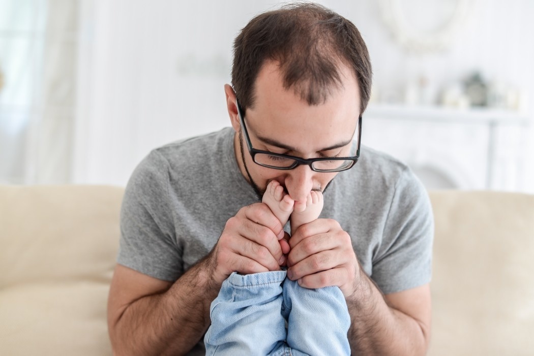 85 percent of dads would do anything to be more involved with their babies featured Motherly