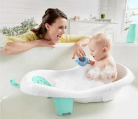 mom-giving-kid-bath-in-tub