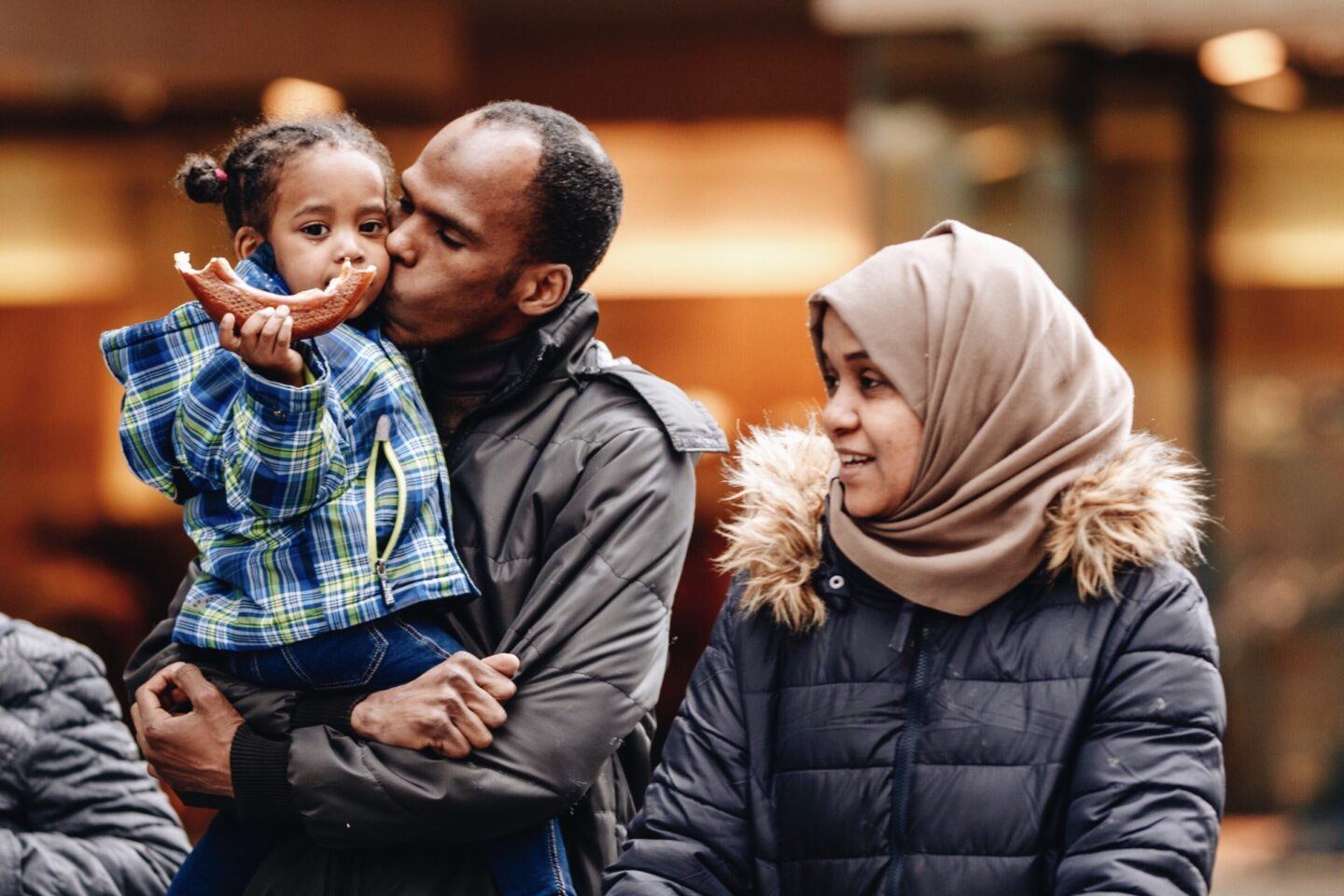 Happy family engaging in praise and positive parenting