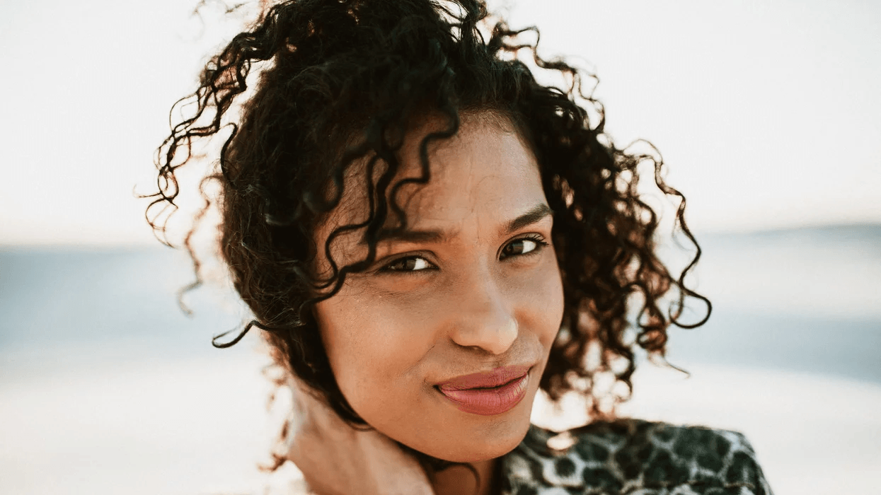 woman smiling on the beach