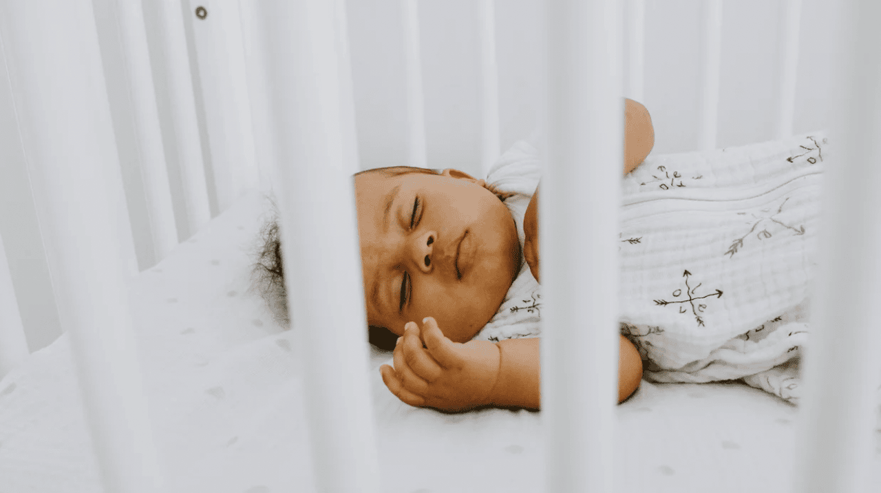 baby sleeping in a crib