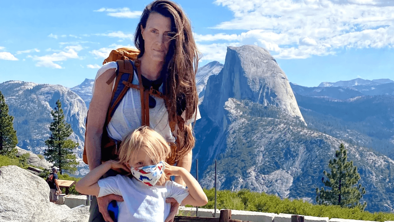 Ara Katz and her son in front of a mountain