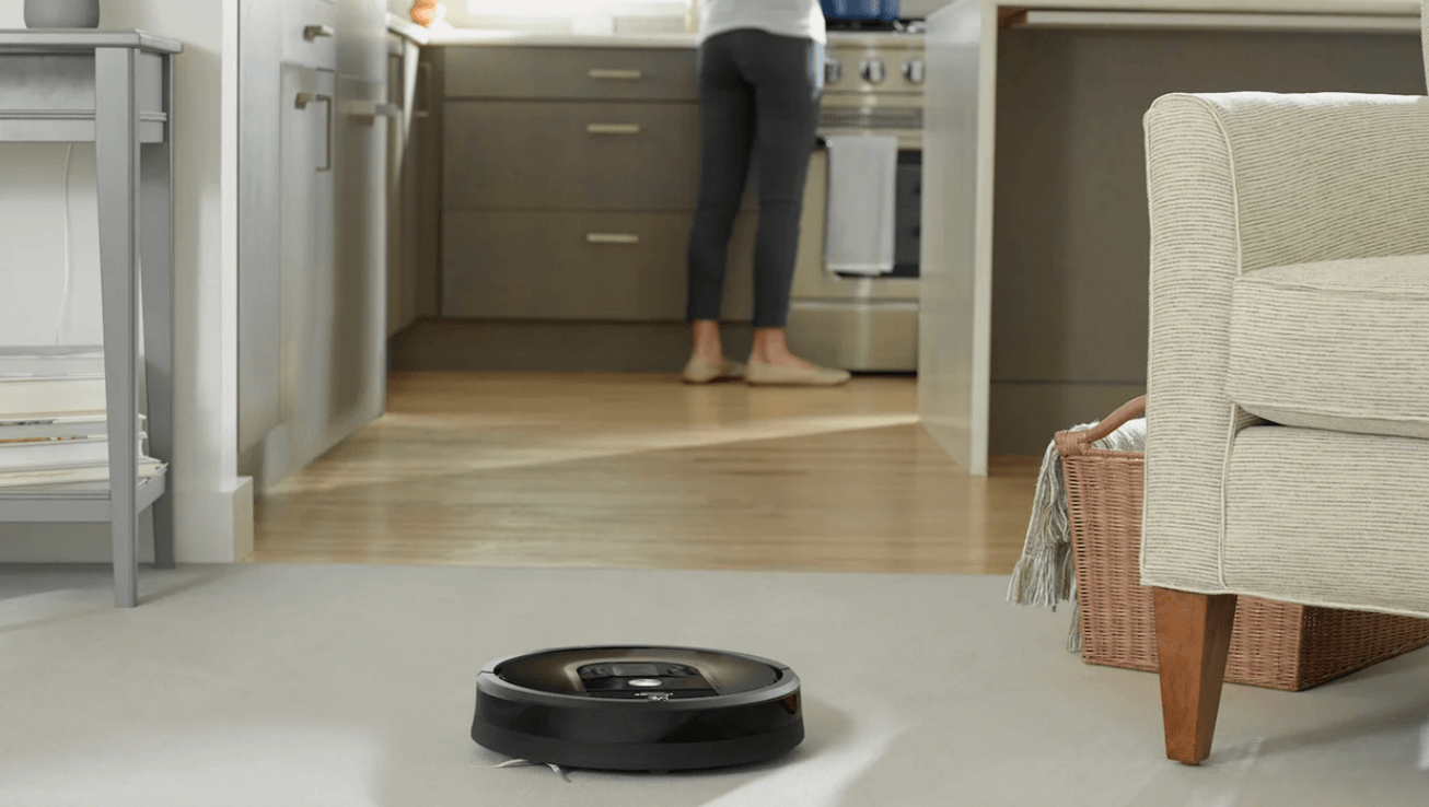 Roomba vacuuming a floor