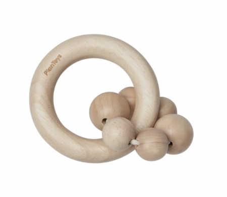 wooden teether rattle, a classic developmental toy for 6-month-olds