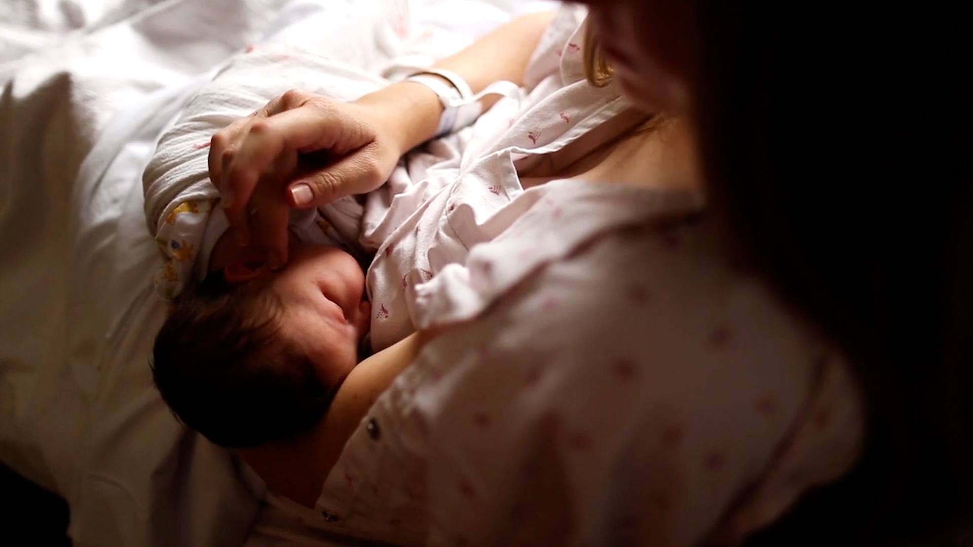 mom breastfeeding a baby