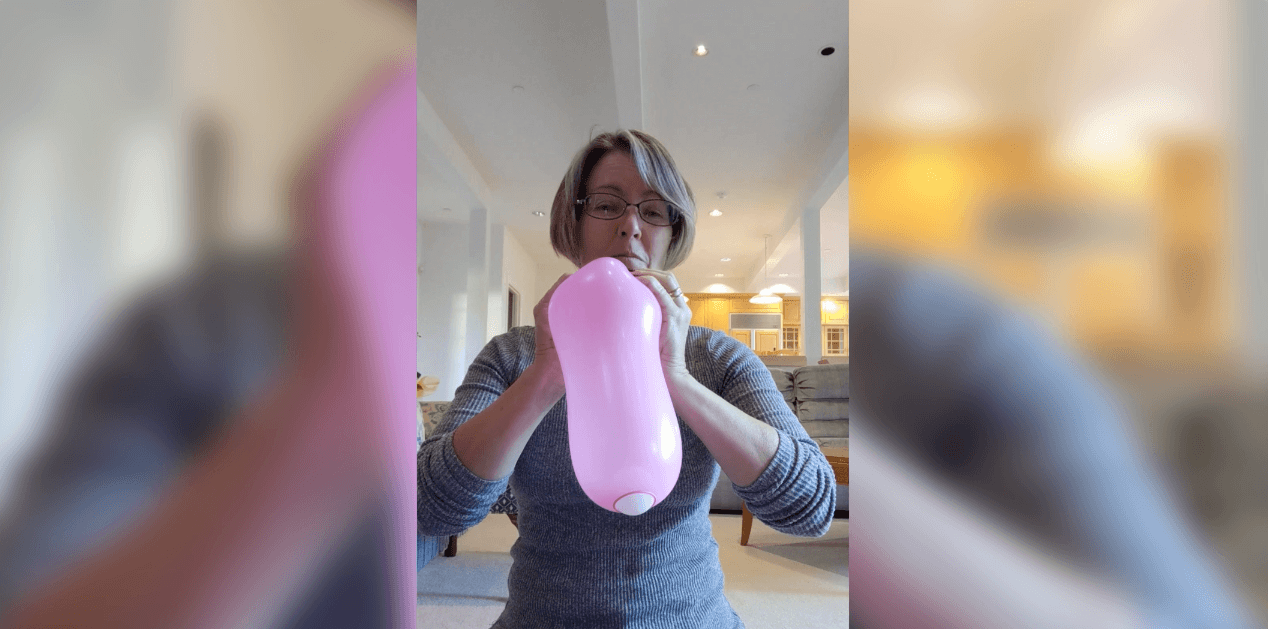 woman playing with a balloon