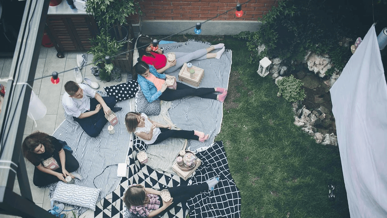 friends having an outdoor movie night